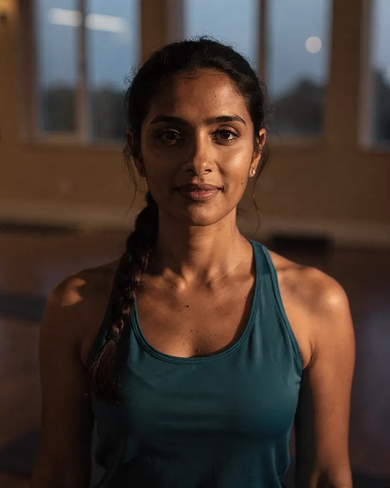 Priya, a yoga teacher in her thirties, in the studio